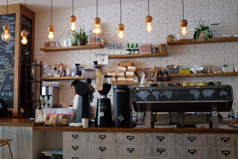 A modern specialty cafe counter with brewing equipment